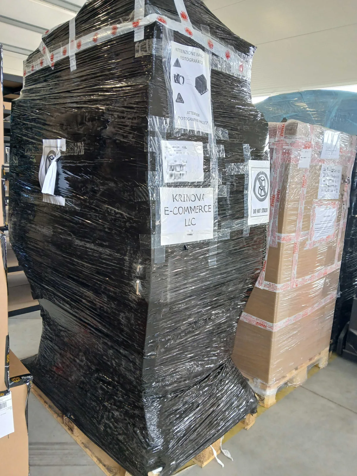 KRINOVA warehouse operations: outbound pallets wrapped and labeled for shipment