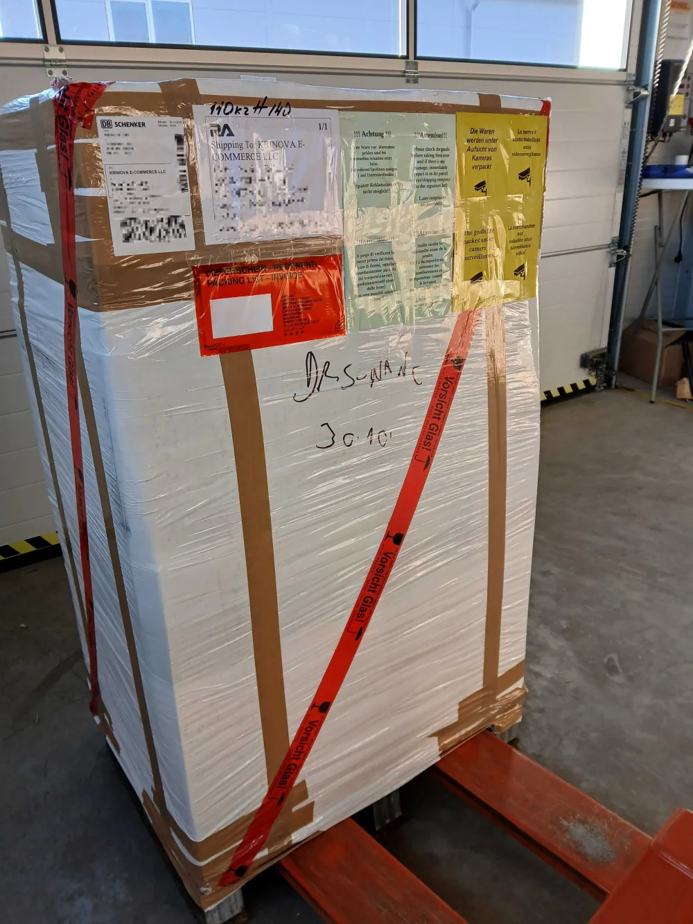 KRINOVA warehouse operations: stretch-wrapped and strapped for safe transit