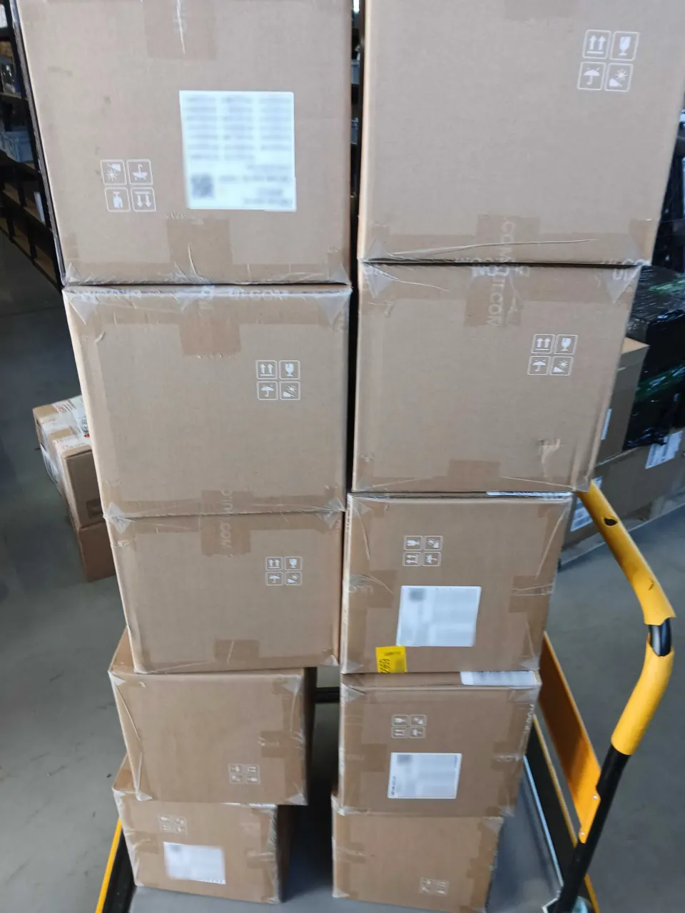 KRINOVA warehouse operations: cartons staged for the inbound check